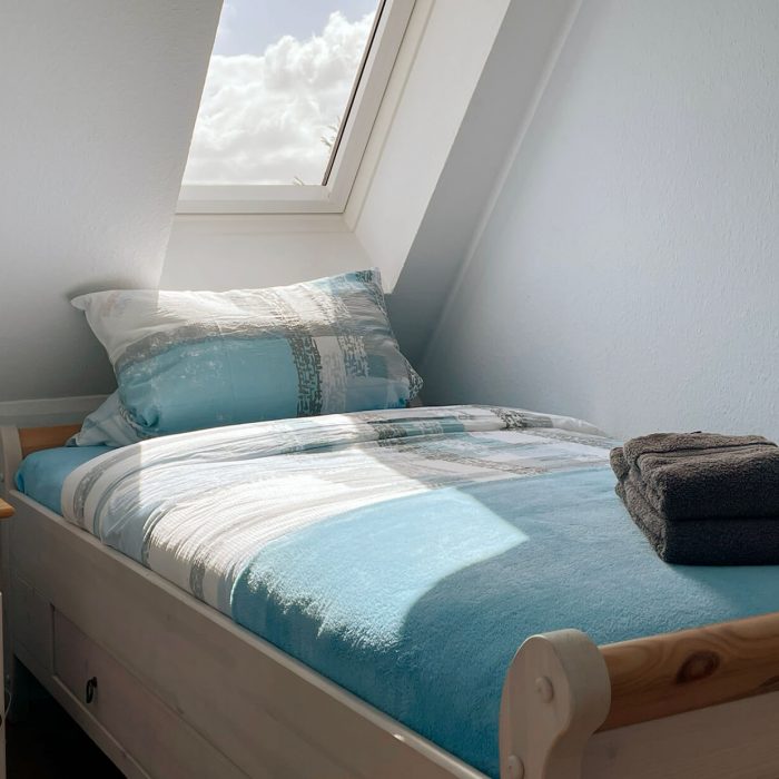 Schlafzimmer in der Ferienwohnung Seekadett in Harlesiel